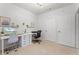 Functional home office with dual desks, carpet, and a streamlined design at 209 Villa Di Este Ter # 205, Lake Mary, FL 32746
