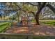 Community playground with play equipment, fostering a fun and active lifestyle at 209 Villa Di Este Ter # 205, Lake Mary, FL 32746
