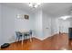 A charming dining area showcases a minimalist table and a view of the home's interior at 2120 Windsor Lake Cir, Sanford, FL 32773