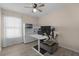 Bright home office with built-in shelving and desk, and light-colored floors at 2120 Windsor Lake Cir, Sanford, FL 32773