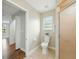 Bathroom featuring a shower and neutral toned tile flooring at 2193 County Road 204, Oxford, FL 34484