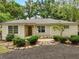 Charming single-story home with well-manicured landscaping and inviting entrance at 2193 County Road 204, Oxford, FL 34484