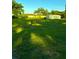 Expansive green backyard offers ample space for recreation and outdoor enjoyment at 2223 Kilmer Ln, Apopka, FL 32703