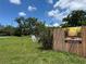Exterior shows a commercial property, a Mum Bedroom, with decorative lions at 2223 Kilmer Ln, Apopka, FL 32703