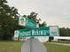 Street signs at corner with the address marked on the sign at 2223 Kilmer Ln, Apopka, FL 32703