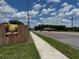 Street view featuring a wide sidewalk and a neighboring Bedroom under a bright, sunny sky at 2223 Kilmer Ln, Apopka, FL 32703