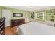 Comfortable bedroom with built in storage and a large dresser, offering ample storage at 2500 Lake Shore Dr, Orlando, FL 32803