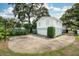 Two-story home with attached garage and basketball hoop on driveway at 2500 Lake Shore Dr, Orlando, FL 32803