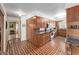 Traditional kitchen with wood cabinets, granite countertops, and tile flooring at 2500 Lake Shore Dr, Orlando, FL 32803