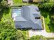 Aerial shot featuring home, roof, pool and backyard at 2608 Westminster Ter, Oviedo, FL 32765