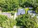 Aerial view of property showcasing backyard pool and neighborhood at 2608 Westminster Ter, Oviedo, FL 32765