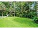 Expansive grassy backyard space at 2608 Westminster Ter, Oviedo, FL 32765