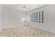 Bedroom featuring light, neutral colors, a ceiling fan, and ample natural light from a window at 2608 Westminster Ter, Oviedo, FL 32765