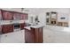 Gourmet kitchen featuring granite countertops and stainless steel appliances at 2608 Westminster Ter, Oviedo, FL 32765