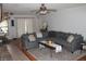 Inviting living room with a neutral palette, stylish sectional sofa, and decorative accents at 26586 Se Highway 42, Umatilla, FL 32784