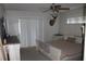 Serene main bedroom with neutral tones, natural light, and comfortable furnishings, promoting relaxation at 26586 Se Highway 42, Umatilla, FL 32784