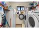Practical laundry area with window and ample storage at 27714 Lois Dr, Tavares, FL 32778
