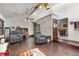 Large living space with vaulted ceiling and comfortable seating at 27714 Lois Dr, Tavares, FL 32778