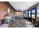 Spacious sunroom with tile floor and multiple windows with natural light at 27714 Lois Dr, Tavares, FL 32778