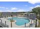 Large community pool with ample seating, lounging, and clubhouse areas at 3124 Addison Blvd, St Cloud, FL 34771