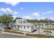 Beautiful lakefront house with lovely deck, pool and manicured landscaping at 3124 Addison Blvd, St Cloud, FL 34771