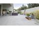Backyard patio featuring potted plants, a white fence, and ample space for outdoor activities at 3202 Timber Hawk Cir, Ocoee, FL 34761