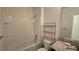 Bright bathroom features a shower-tub combo and granite vanity top at 3202 Timber Hawk Cir, Ocoee, FL 34761