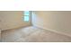 Comfortable bedroom with carpet, a large window and natural light at 3202 Timber Hawk Cir, Ocoee, FL 34761