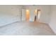 Bright bedroom with plush carpeting, ensuite bathroom, and walk-in closet at 3202 Timber Hawk Cir, Ocoee, FL 34761