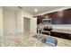 Close-up of the kitchen featuring stainless appliances and granite countertops at 3202 Timber Hawk Cir, Ocoee, FL 34761