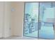 Sliding glass doors leading to patio or outdoor space; lots of plants at 3202 Timber Hawk Cir, Ocoee, FL 34761