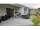 Covered patio with planters, seating, and storage bench for outdoor enjoyment at 3202 Timber Hawk Cir, Ocoee, FL 34761