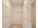 Walk-in closet with wire shelving ready for organization at 3202 Timber Hawk Cir, Ocoee, FL 34761