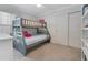 Comfortable bedroom featuring a bunk bed, neutral colors, and ample closet space at 3226 Helen Ave, Orlando, FL 32804