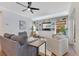 Inviting living room with custom built-ins, natural light, and comfortable seating arrangement at 3226 Helen Ave, Orlando, FL 32804
