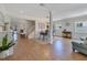 Spacious and inviting open-concept living space featuring modern furnishings and wood-look floors at 3226 Helen Ave, Orlando, FL 32804