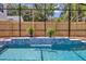 Backyard swimming pool with attached spa featuring a small waterfall feature with plants at 3226 Helen Ave, Orlando, FL 32804
