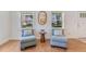 Charming sitting area features comfortable seating, creating an inviting space for relaxation and conversation at 3226 Helen Ave, Orlando, FL 32804