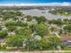 Beautiful aerial view showcasing a residential area with lush trees and a lake in the distance at 404 Broadview Ave, Altamonte Springs, FL 32701