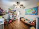 This bedroom features hardwood floors and pirate-themed decor at 404 Broadview Ave, Altamonte Springs, FL 32701