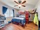 This bedroom features hardwood floors, bunk beds, and ample storage at 404 Broadview Ave, Altamonte Springs, FL 32701
