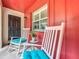 Charming front porch with rocking chairs, creating a welcoming outdoor living space at 404 Broadview Ave, Altamonte Springs, FL 32701