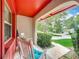 Comfortable rocking chairs on the front porch, perfect for enjoying the outdoors at 404 Broadview Ave, Altamonte Springs, FL 32701