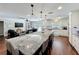 Expansive kitchen island with granite countertops connects to living room at 404 Broadview Ave, Altamonte Springs, FL 32701