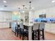 Spacious kitchen features a large island with seating and custom lighting at 404 Broadview Ave, Altamonte Springs, FL 32701