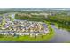 Aerial view showcasing the community's layout, lakes, and surrounding landscape at 4952 Longmeadow Park St, Orlando, FL 32811