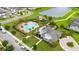 Aerial view of a community center that features a large outdoor pool with covered seating at 4952 Longmeadow Park St, Orlando, FL 32811
