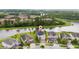 Charming two-story home with a well-manicured front yard and an attached two-car garage at 4952 Longmeadow Park St, Orlando, FL 32811