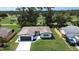 Aerial view of a well kept single-Gathering home in a golf course community at 550 Eagle Dr, Daytona Beach, FL 32117