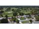 Charming single-story home with a two-car garage, nestled on a lush lot near the golf course at 550 Eagle Dr, Daytona Beach, FL 32117